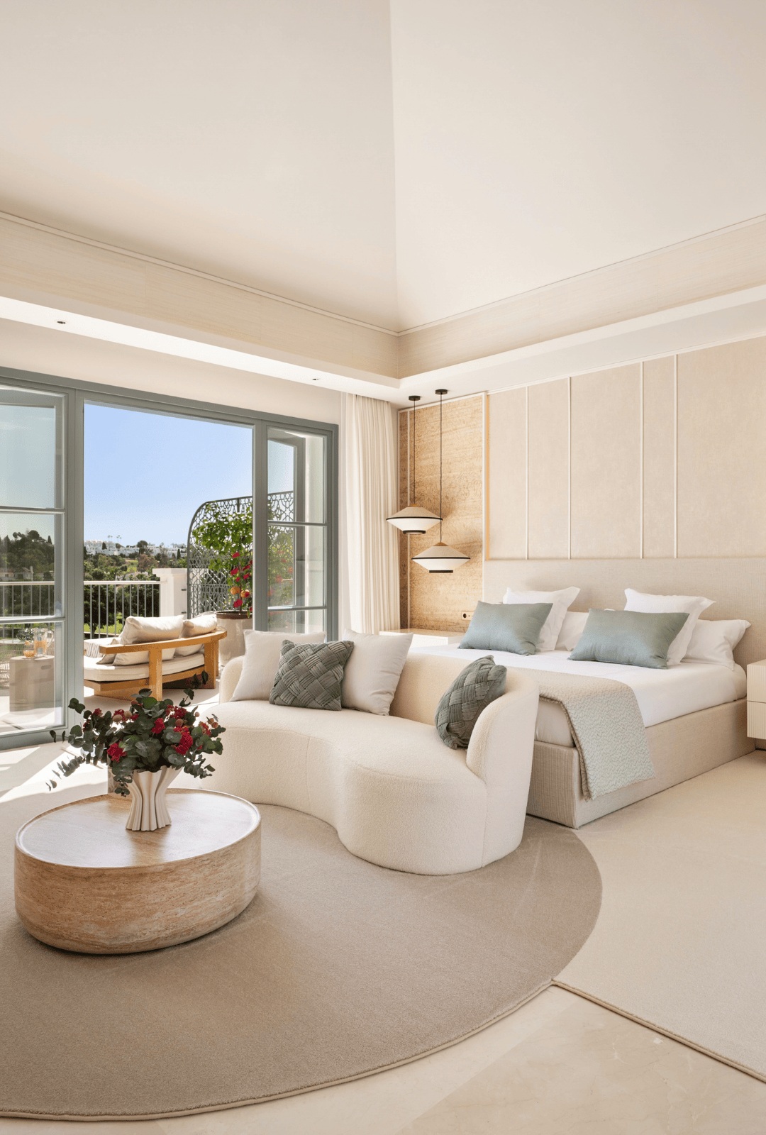 Natural light and coloured interior of a spacious bedroom